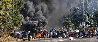 Civil unrest with burning debris